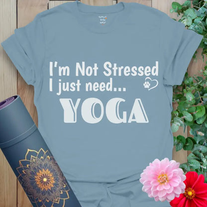 Stone Blue Not Stressed T-Shirt featuring large white “YOGA” lettering, a cozy, yoga-friendly tee for stress-free living.