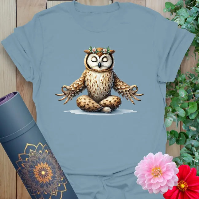 Muted stone blue yoga t-shirt with peaceful owl illustration symbolizing inner wisdom, calm, and conscious growth.