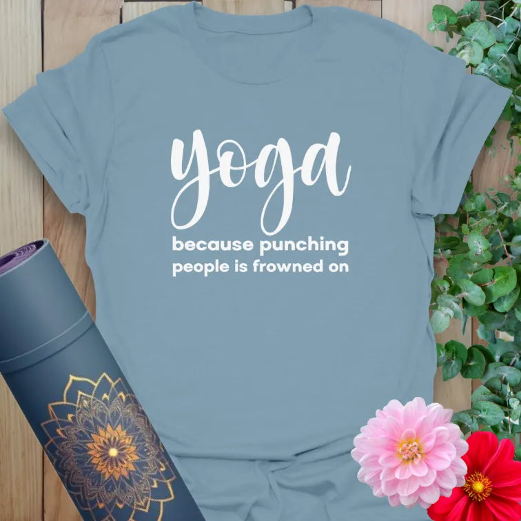 Muted stone blue yoga t-shirt featuring playful yoga humor quote encouraging relaxed, joyful, mindful movement.