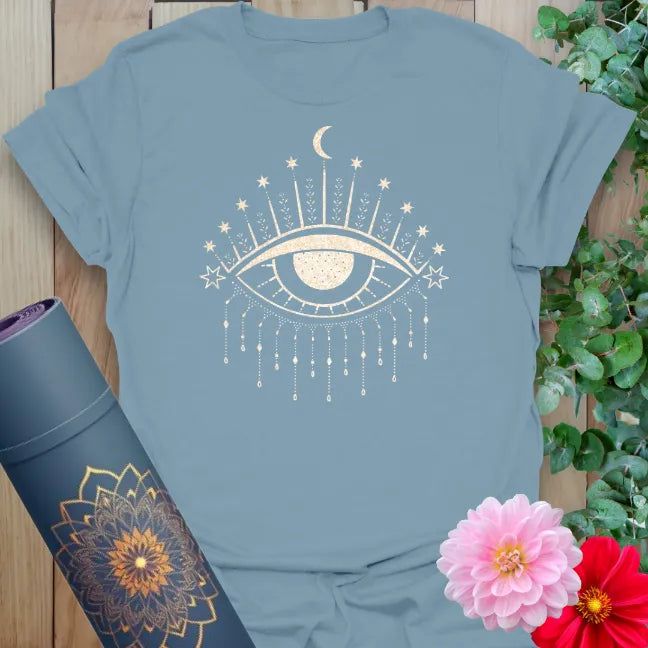 Muted stone blue yoga tee featuring intricate celestial eye and star detailing, perfect for inner vision and spiritual style.