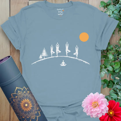 Stone Blue Tree Line T-Shirt with clean white Tree Pose line art and warm sun detail. Minimalist yoga lifestyle tee.