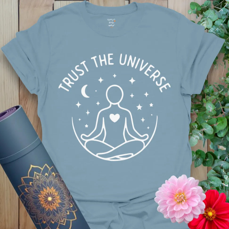 Muted stone blue yoga t-shirt with celestial meditation art and universal trust mantra for grounded, cosmic living.