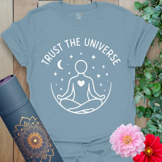 Muted stone blue yoga t-shirt with celestial meditation art and universal trust mantra for grounded, cosmic living.