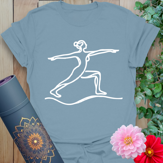 Muted stone blue t-shirt with fluid yoga pose artwork for balance, strength, and style.