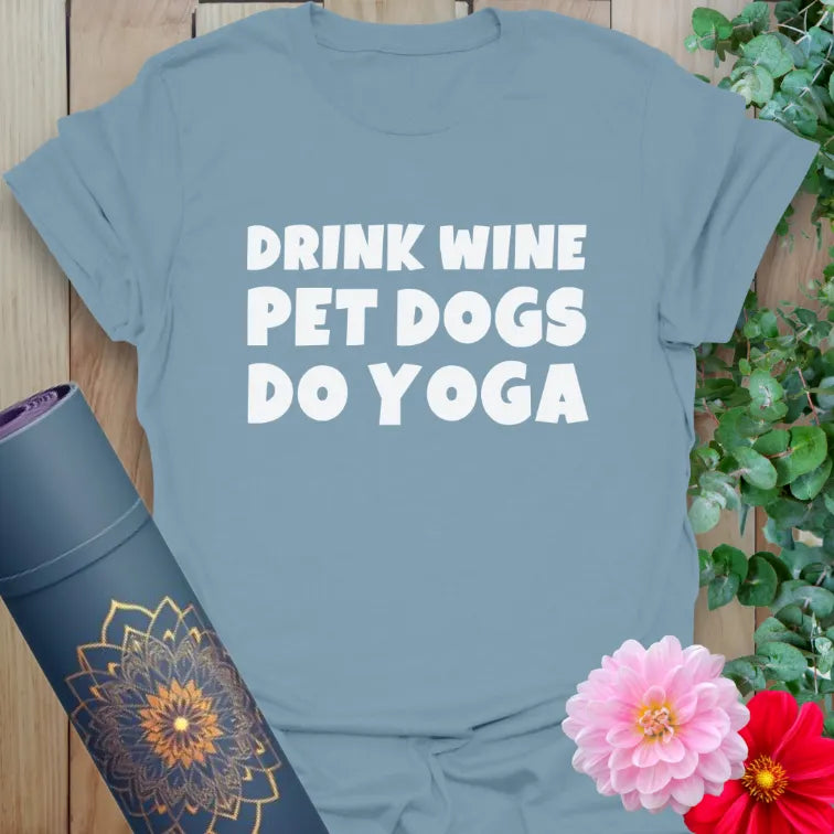 Muted stone blue t-shirt with bold text design celebrating yoga, wine, and dog love in perfect harmony.