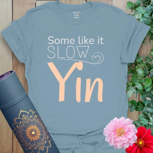 Stone Blue Yin T-Shirt with serene script and peach typography. A cozy, calm yoga lifestyle tee.