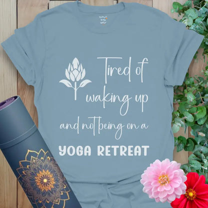 Stone Blue Yoga Retreat T-Shirt with playful travel-themed yoga quote and lotus graphic. Calm, minimalist design for yogis.