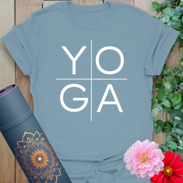 Muted stone blue yoga tee with modern “YOGA” block design for subtle, soulful style.