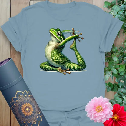 Muted stone blue yoga t-shirt with artistic frog in yoga pose for relaxed, joyful movement wear.