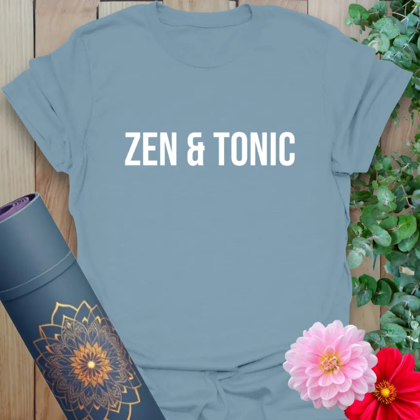 Muted stone blue t-shirt with simple “Zen & Tonic” design for relaxed, spirited yoga expression.