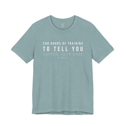 200 HOURS OF TRAINING TO TELL YOU SOFTEN YOUR GAZE yoga teacher gift tee flat lay in Heather Blue Lagoon — Yoga Teacher Gifts collection by Ramro Yoga Wear