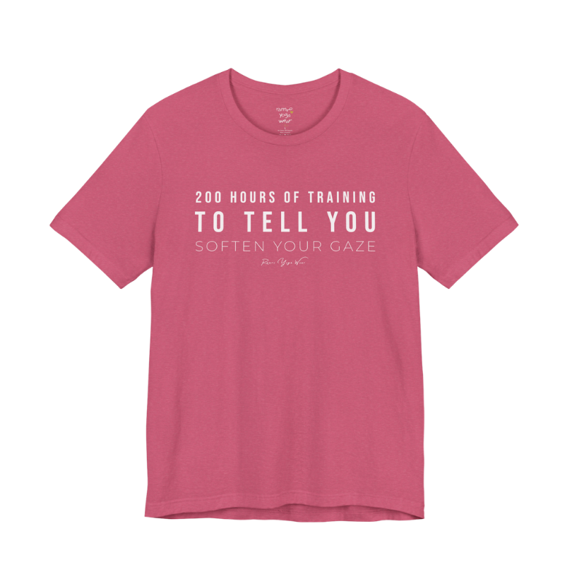 200 HOURS OF TRAINING TO TELL YOU SOFTEN YOUR GAZE yoga teacher gift tee flat lay in Heather Raspberry — Yoga Teacher Gifts collection by Ramro Yoga Wear