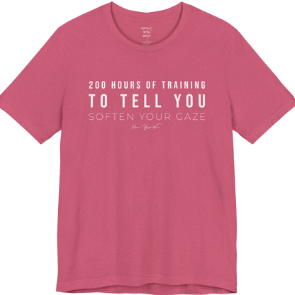200 HOURS OF TRAINING TO TELL YOU SOFTEN YOUR GAZE yoga teacher gift tee flat lay in Heather Raspberry — Yoga Teacher Gifts collection by Ramro Yoga Wear