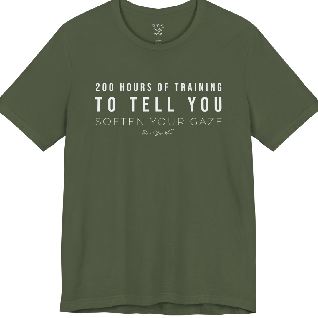 200 HOURS OF TRAINING TO TELL YOU SOFTEN YOUR GAZE yoga teacher gift tee flat lay in Military Green — Yoga Teacher Gifts collection by Ramro Yoga Wear