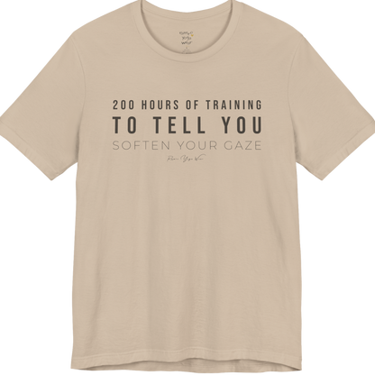 200 HOURS OF TRAINING TO TELL YOU SOFTEN YOUR GAZE yoga teacher gift tee flat lay in Tan — Yoga Teacher Gifts collection by Ramro Yoga Wear