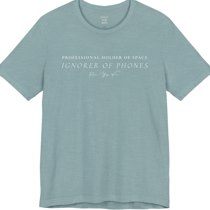 PROFESSIONAL HOLDER OF SPACE IGNORER OF PHONES yoga teacher gift tee flat lay in Heather Blue Lagoon — Yoga Teacher Gifts collection by Ramro Yoga Wear