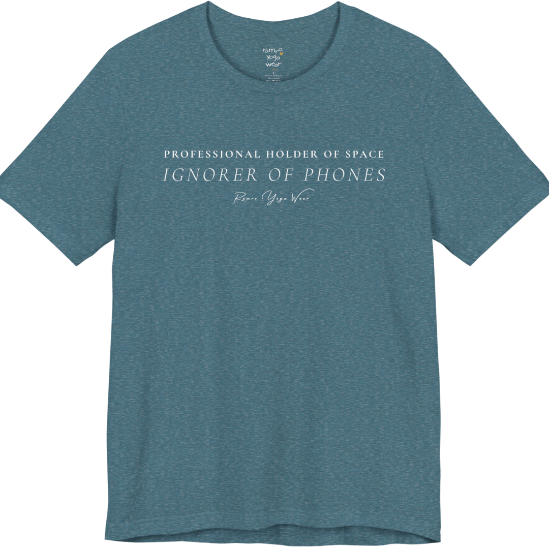 PROFESSIONAL HOLDER OF SPACE IGNORER OF PHONES yoga teacher gift tee flat lay in Heather Deep Teal  — Yoga Teacher Gifts collection by Ramro Yoga Wear
