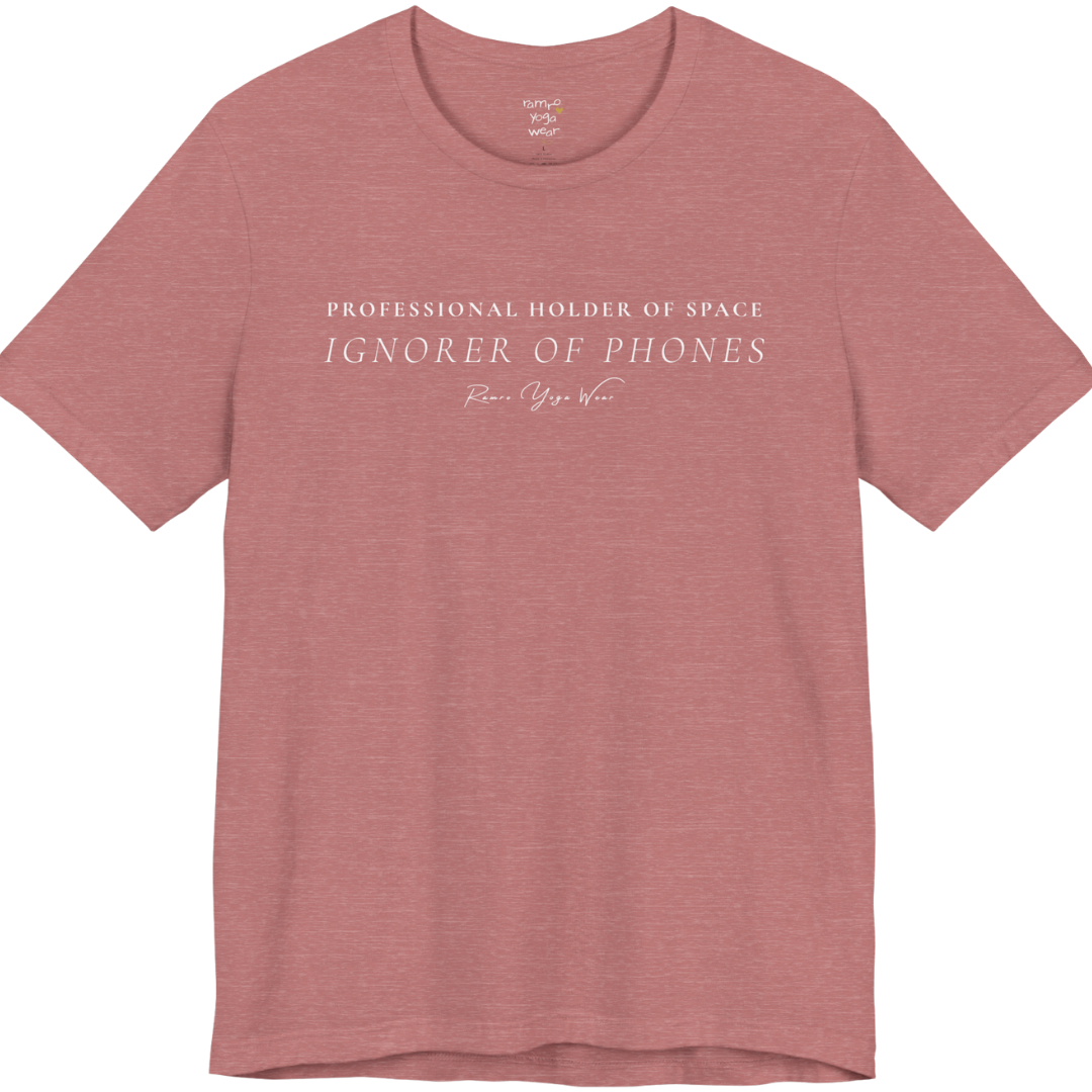 PROFESSIONAL HOLDER OF SPACE IGNORER OF PHONES yoga teacher gift tee flat lay in Heather Mauve — Yoga Teacher Gifts collection by Ramro Yoga Wear