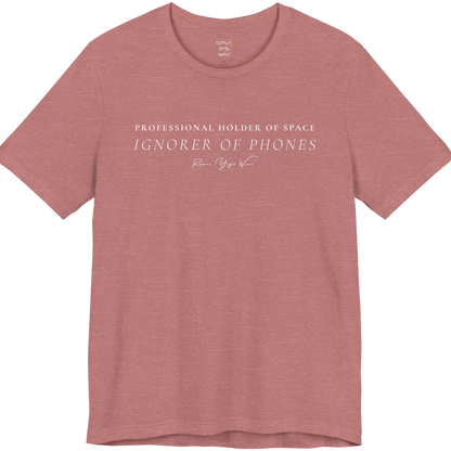 PROFESSIONAL HOLDER OF SPACE IGNORER OF PHONES yoga teacher gift tee flat lay in Heather Mauve — Yoga Teacher Gifts collection by Ramro Yoga Wear
