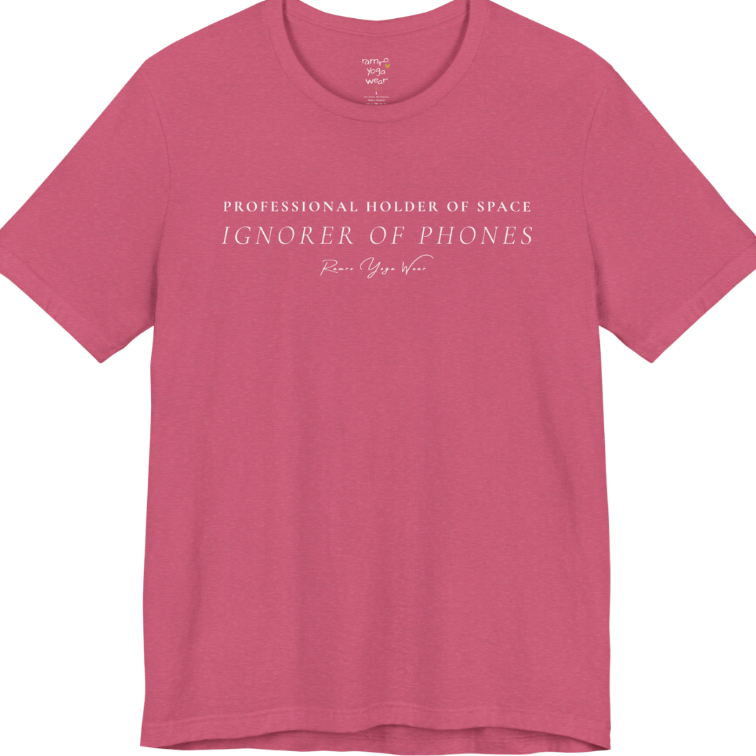 PROFESSIONAL HOLDER OF SPACE IGNORER OF PHONES yoga teacher gift tee flat lay in Heather Raspberry — Yoga Teacher Gifts collection by Ramro Yoga Wear