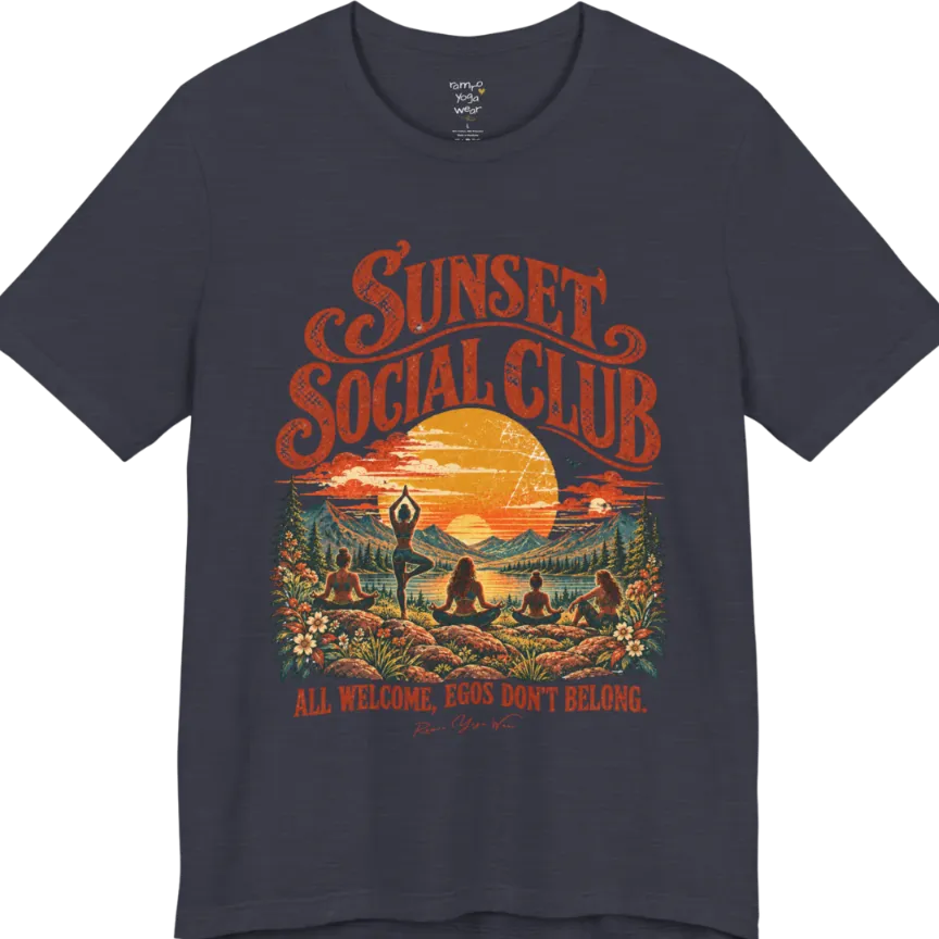 A short sleeved tee called the Sunset T-Shirt, flat lay and a Bella + Canvas 3001 shirt. Simply says, Sunset Social Club, All Welcome, Egos Don't Belong. Design highlights several people meditating together across a mountain landscape at sunset, with a large setting sun, pine trees, and florals, in a color vintage travel-poster illustration. Color is Heather Midnight Navy.