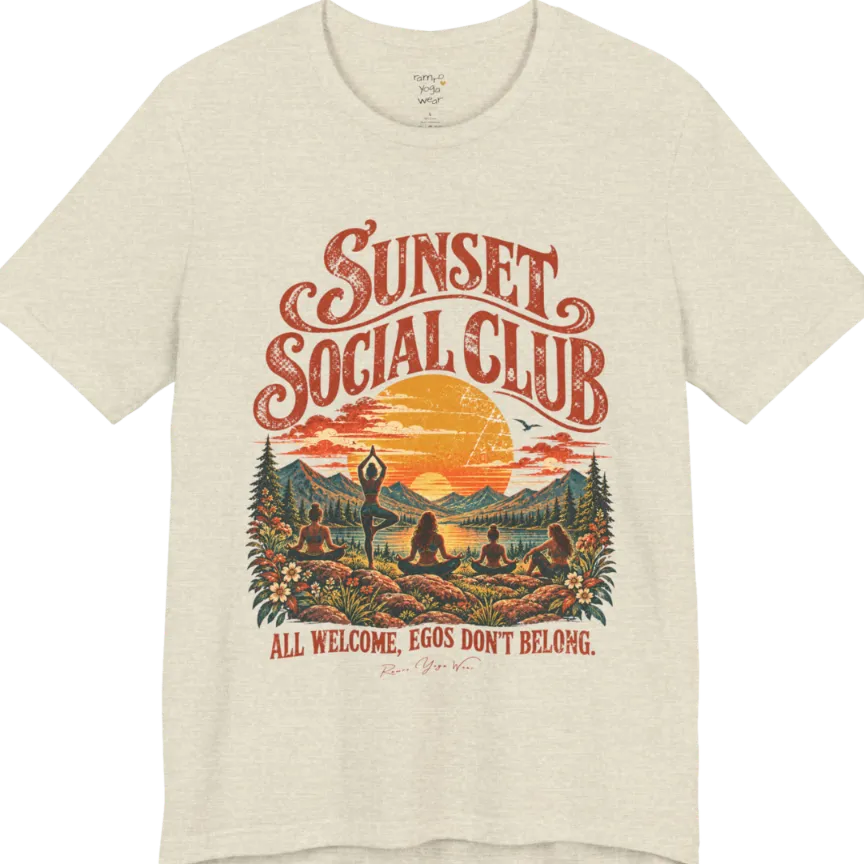 A short sleeved tee called the Sunset T-Shirt, flat lay and a Bella + Canvas 3001 shirt. Simply says, Sunset Social Club, All Welcome, Egos Don't Belong. Design highlights several people meditating together across a mountain landscape at sunset, with a large setting sun, pine trees, and florals, in a color vintage travel-poster illustration. Color is Heather Prism Natural.