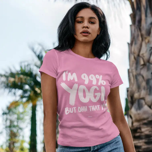Woman wearing the That 1 T-Shirt in a casual lifestyle setting featuring retro yoga typography and playful mindful slogan. Relaxed yoga-inspired streetwear look.