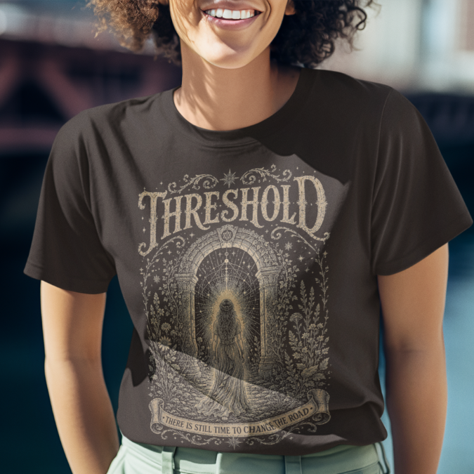 Woman wearing Threshold dark chocolate meditation shirt near water — Dark Sacred Stillness collection by Ramro Yoga Wear