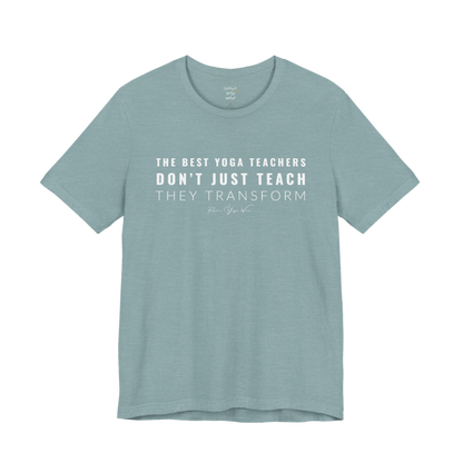 THE BEST YOGA TEACHERS DON'T JUST TEACH THEY TRANSFORM yoga teacher gift tee flat lay in Heather Blue Lagoon — Yoga Teacher Gifts collection by Ramro Yoga Wear