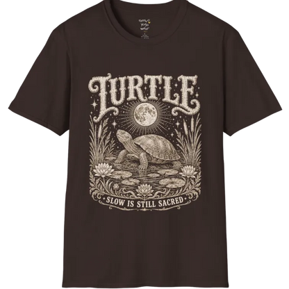 Turtle T-Shirt flat lay with a turtle resting beneath a full moon among lily pads and reeds by calm rippling water — vintage engraved graphic tee by Ramro Yoga Wear in Dark Chocolate.