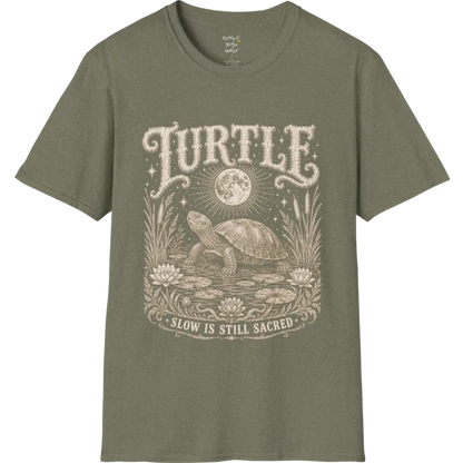 Turtle T-Shirt flat lay with a turtle resting beneath a full moon among lily pads and reeds by calm rippling water — vintage engraved graphic tee by Ramro Yoga Wear in Heather Military Green.