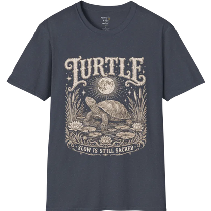 Turtle T-Shirt flat lay with a turtle resting beneath a full moon among lily pads and reeds by calm rippling water — vintage engraved graphic tee by Ramro Yoga Wear in Heather Navy.