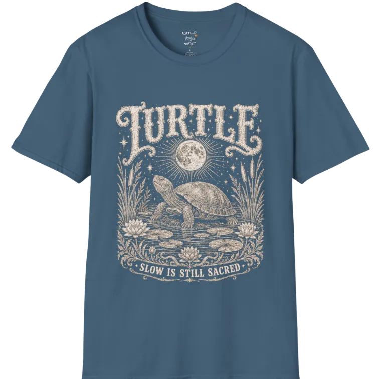 Turtle T-Shirt flat lay with a turtle resting beneath a full moon among lily pads and reeds by calm rippling water — vintage engraved graphic tee by Ramro Yoga Wear in Indigo Blue.