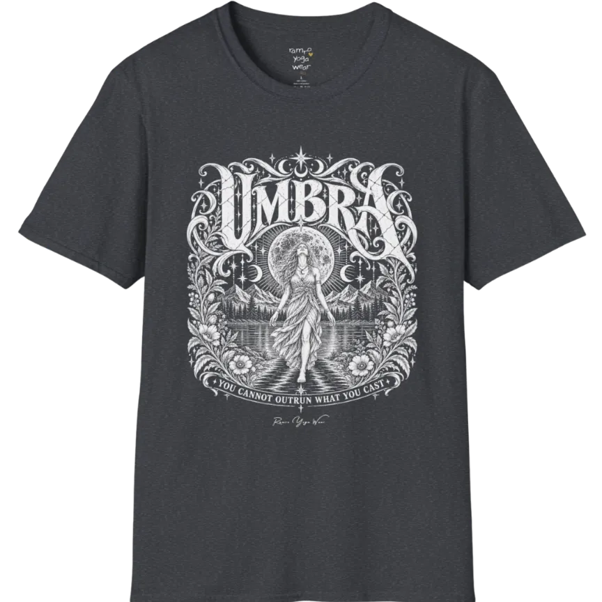 A short sleeved tee called the Umbra T-Shirt, flat lay and a Gildan 64000 shirt. Simply says, You Cannot Outrun What You Cast. Design highlights a moon goddess walking across still water toward distant mountains, framed in ornate vintage lettering with botanical detailing. Color is Dark Heather Grey.
