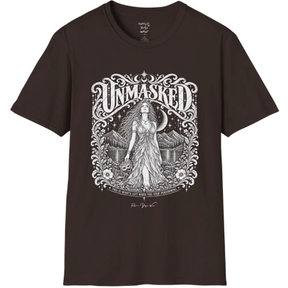 A short sleeved tee called the Unmasked T-Shirt, flat lay and a soft cotton shirt. Simply says, Unmasked. Design highlights an ornate floral crest in white linework with a long-haired figure in a flowing gown beneath a crescent moon, with Unmasked in ornate lettering across the top. Color is Dark Chocolate.