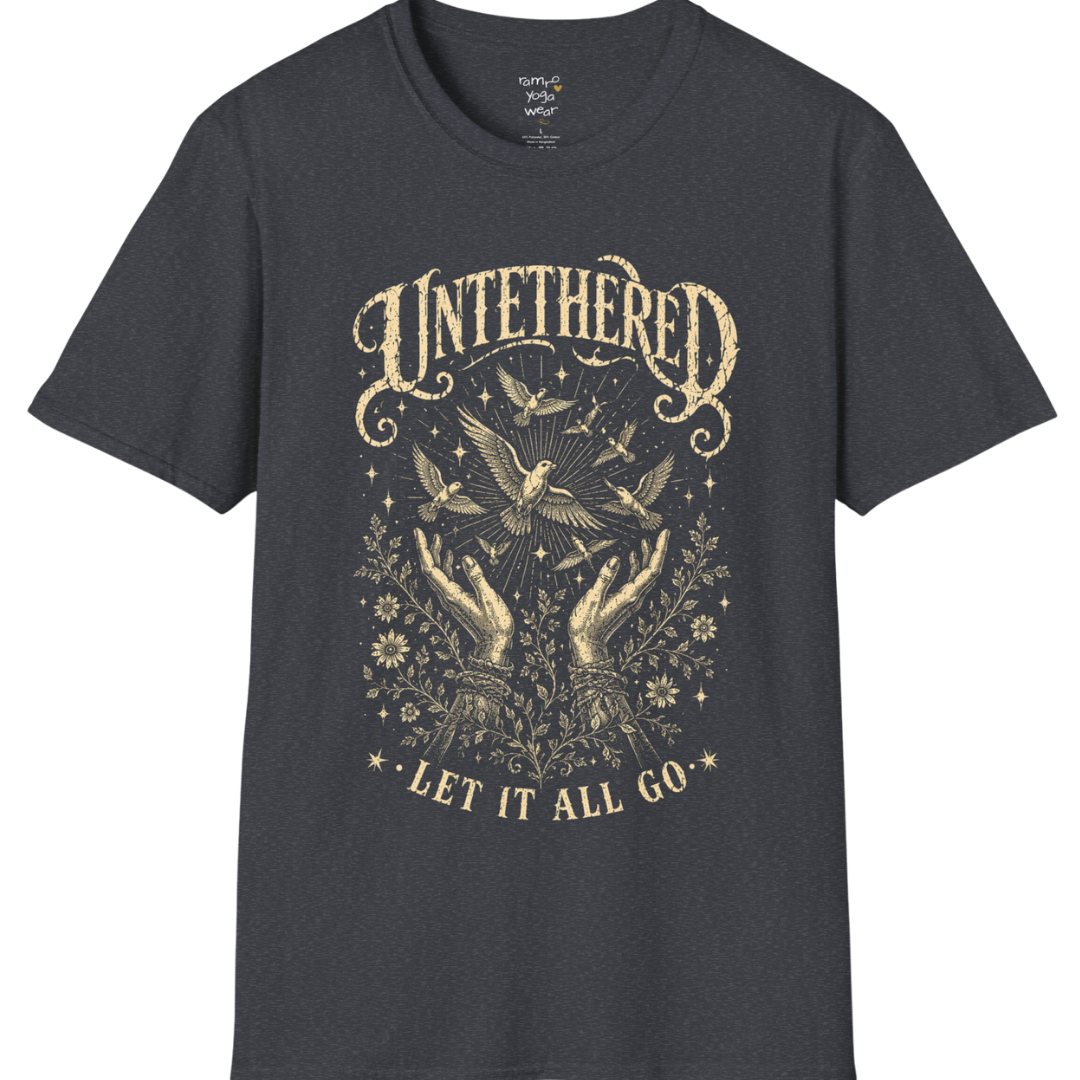 Dark Heather Grey Untethered T-Shirt featuring worn spiritual artwork with birds and celestial details in a calm vintage-inspired yoga streetwear aesthetic.