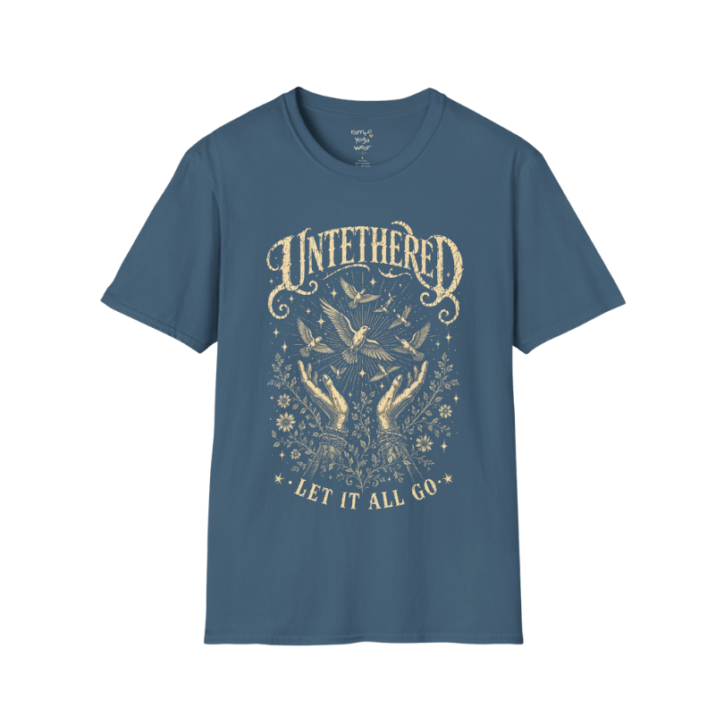 Indigo Blue Untethered T-Shirt with distressed oatmeal mystical graphic and celestial bird artwork inspired by freedom, stillness, and soulful expression.