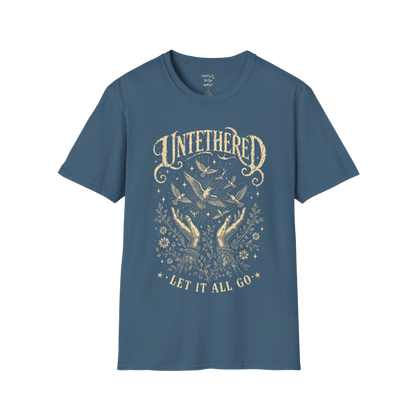 Indigo Blue Untethered T-Shirt with distressed oatmeal mystical graphic and celestial bird artwork inspired by freedom, stillness, and soulful expression.