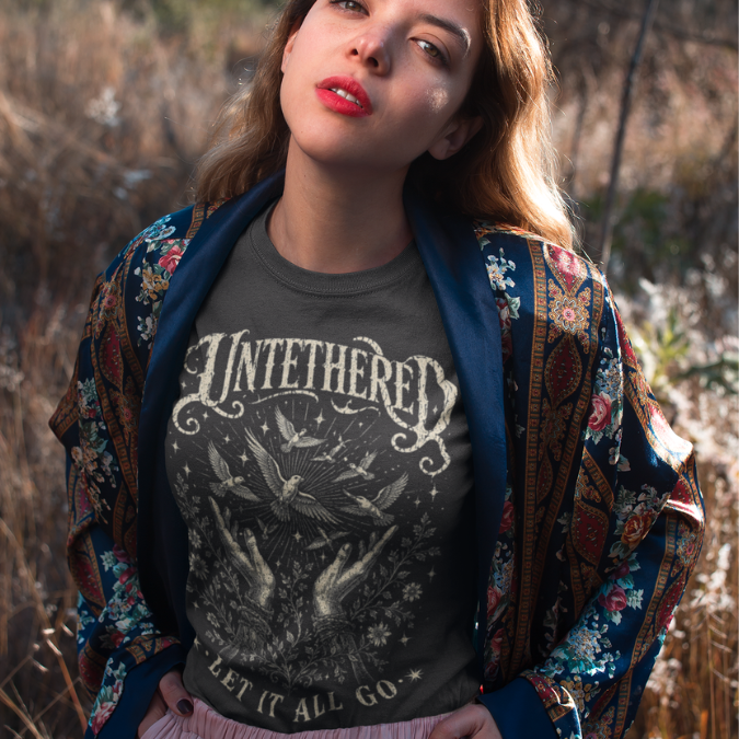 Ramro Yoga Wear Untethered tee in Dark Heather Grey — let it all go birds release vintage design, wild field autumn lifestyle shot