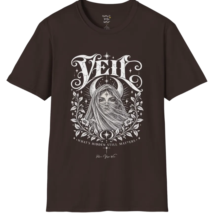 A short sleeved Tee, illustrated with a face partially obscured behind sheer draped fabric, a crescent moon behind, fine botanical framing at the base. Veil T-Shirt flat lay is a Gildan 64000 and the color is Dark Chocolate.