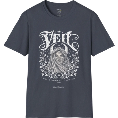 A short sleeved Tee, illustrated with a face partially obscured behind sheer draped fabric, a crescent moon behind, fine botanical framing at the base. Veil T-Shirt flat lay is a Gildan 64000 and the color is Heather Navy.