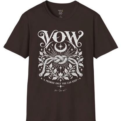 A short sleeved tee, illustrated with a single tied knot emblem and a crescent moon above, framed by fine botanical detailing. Vow T-Shirt flat lay is a Gildan 64000 and the color is Dark Chocolate.