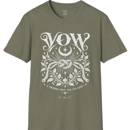 A short sleeved tee, illustrated with a single tied knot emblem and a crescent moon above, framed by fine botanical detailing. Vow T-Shirt flat lay is a Gildan 64000 and the color is Heather Military Green.