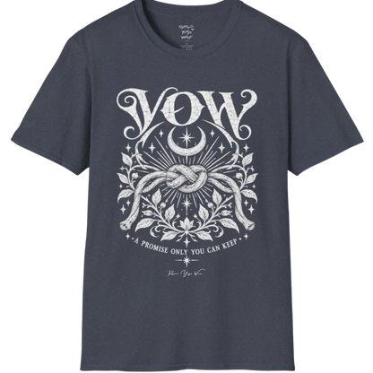 A short sleeved tee, illustrated with a single tied knot emblem and a crescent moon above, framed by fine botanical detailing. Vow T-Shirt flat lay is a Gildan 64000 and the color is Heather Navy.
