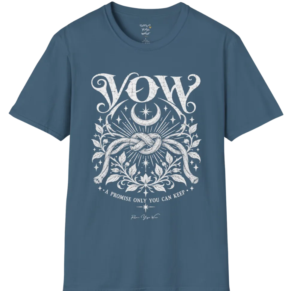 A short sleeved tee, illustrated with a single tied knot emblem and a crescent moon above, framed by fine botanical detailing. Vow T-Shirt flat lay is a Gildan 64000 and the color is Indigo Blue