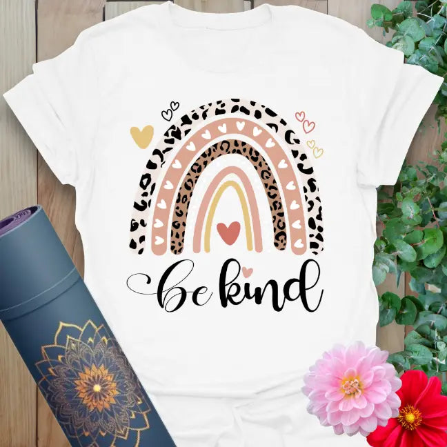White Be Kind T-Shirt with bold retro rainbow and inspirational message