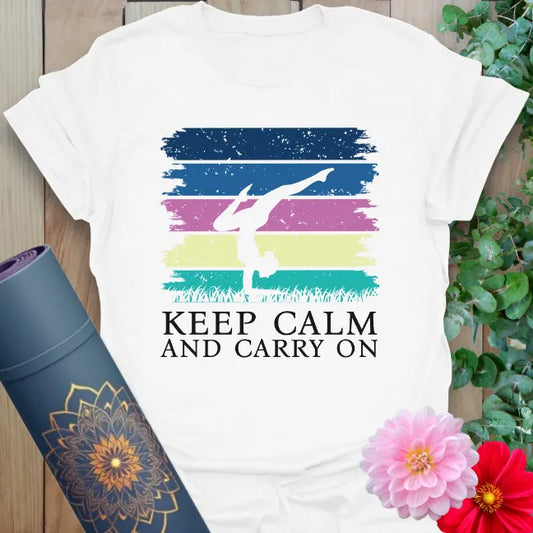 White Carry On T-Shirt with “Keep Calm and Carry On” quote and yoga handstand art