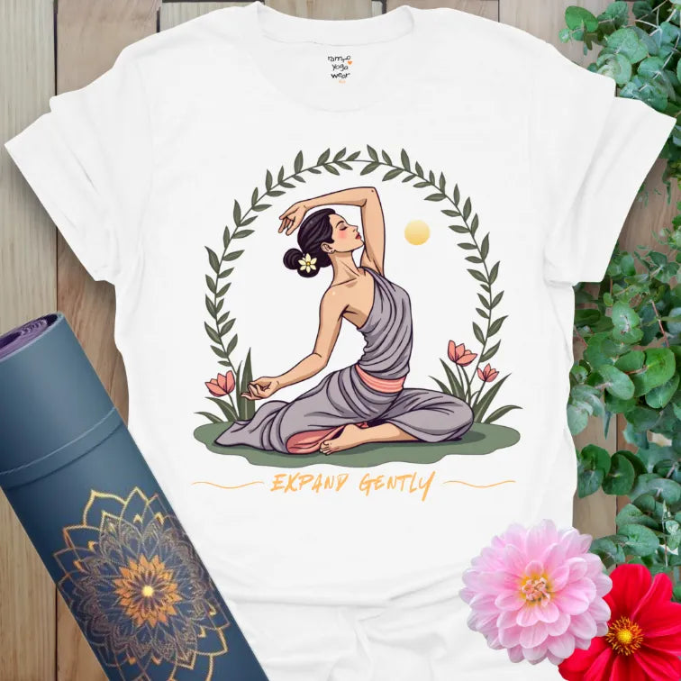 Clean white unisex yoga t-shirt showcasing a heart-opening yogi surrounded by nature and light for conscious growth.