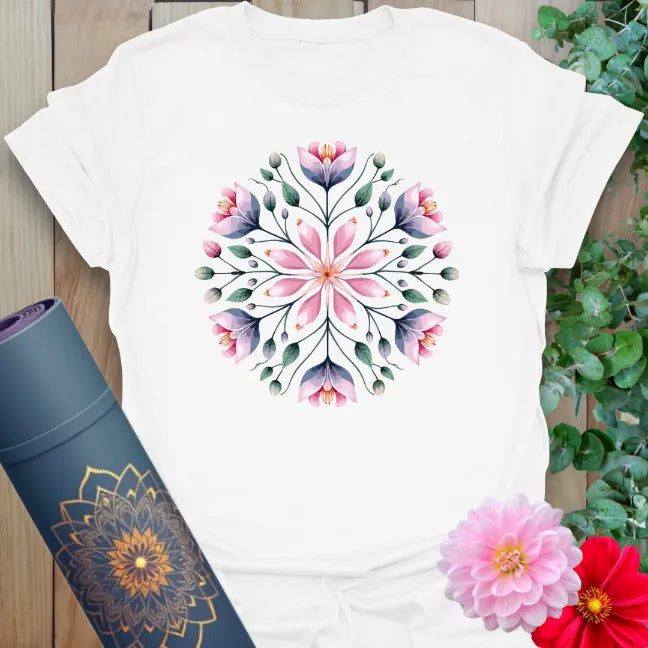 Clean white unisex yoga t-shirt showcasing radiant flower mandala for conscious, heart-centered living.