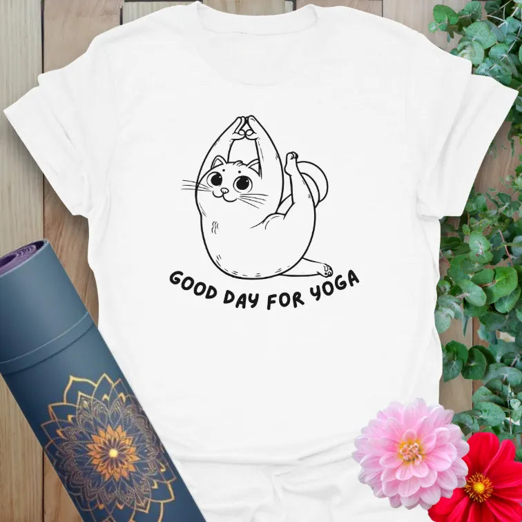 Clean white unisex yoga t-shirt showcasing adorable yoga cat illustration and positive mindful mantra for everyday joy.